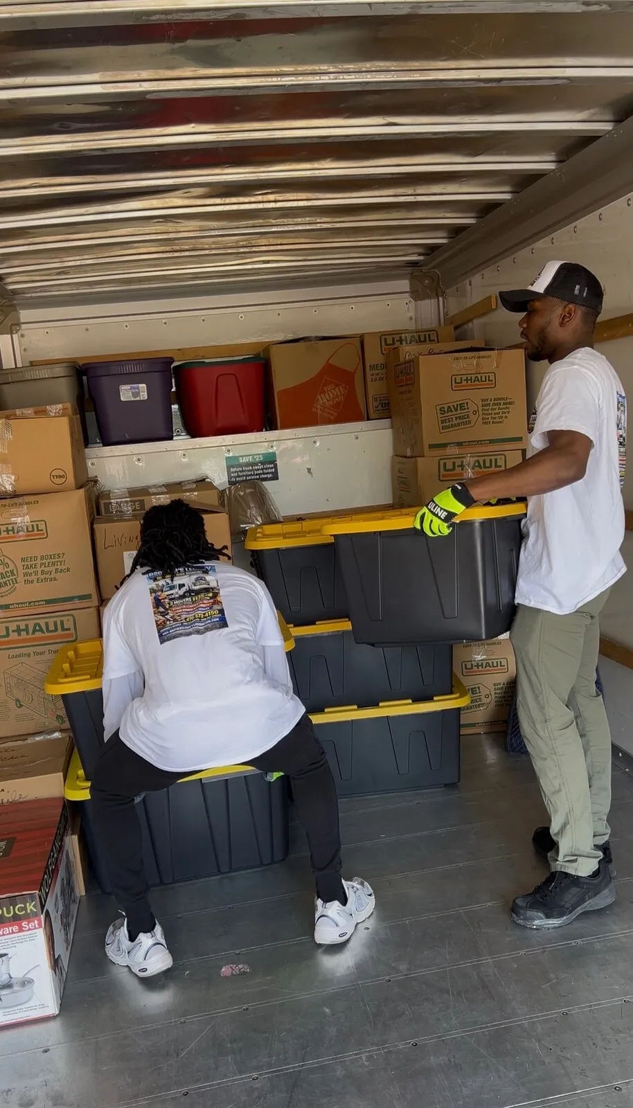 Crew working inside the moving truck