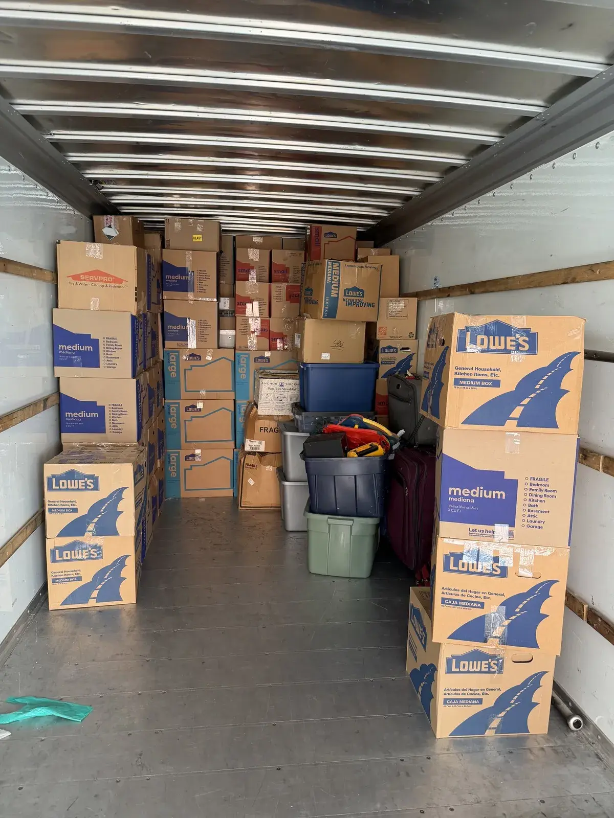 A neatly loaded moving truck interior